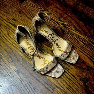 Sam Edelman sandal - a 3.5 in heel & is brown, tan and coral snake skin pattern.